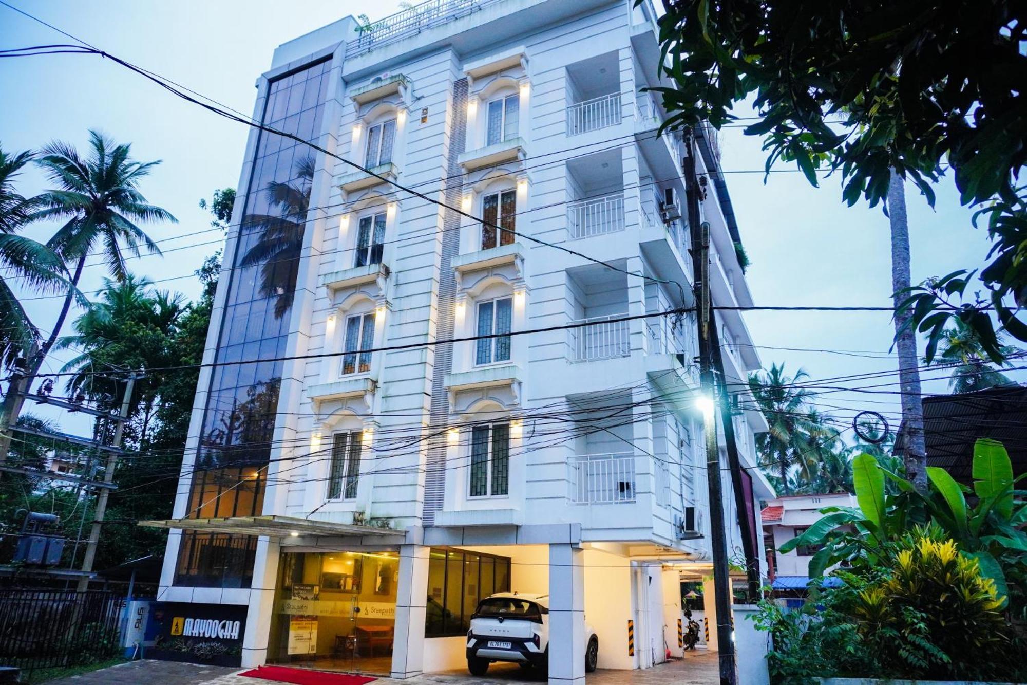 Treebo Trend Sreepathi Mayoogha Guruvayur Bagian luar foto